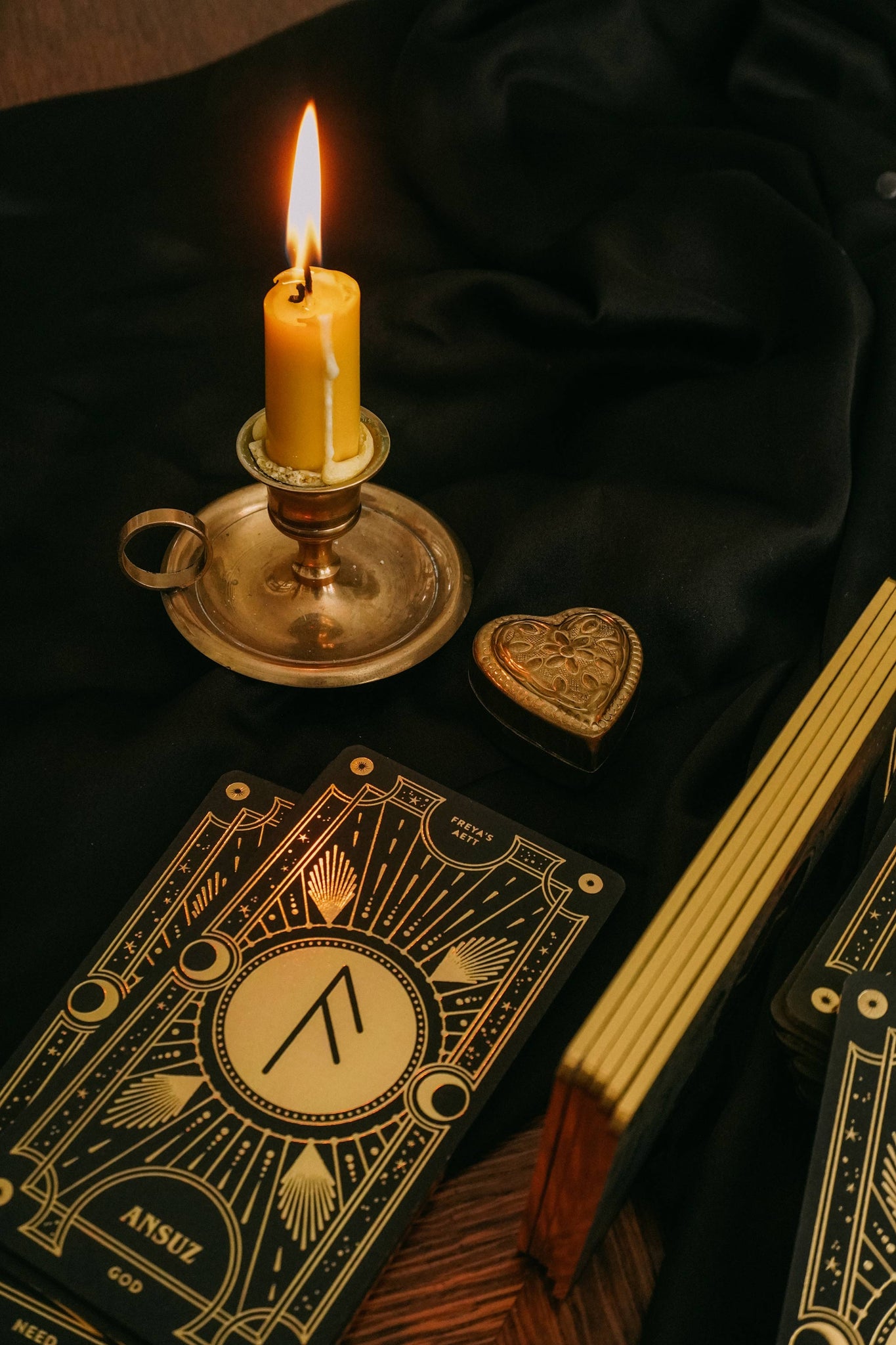 Cosmic Whisper luxury rune deck in black and gold by Cocorrina 