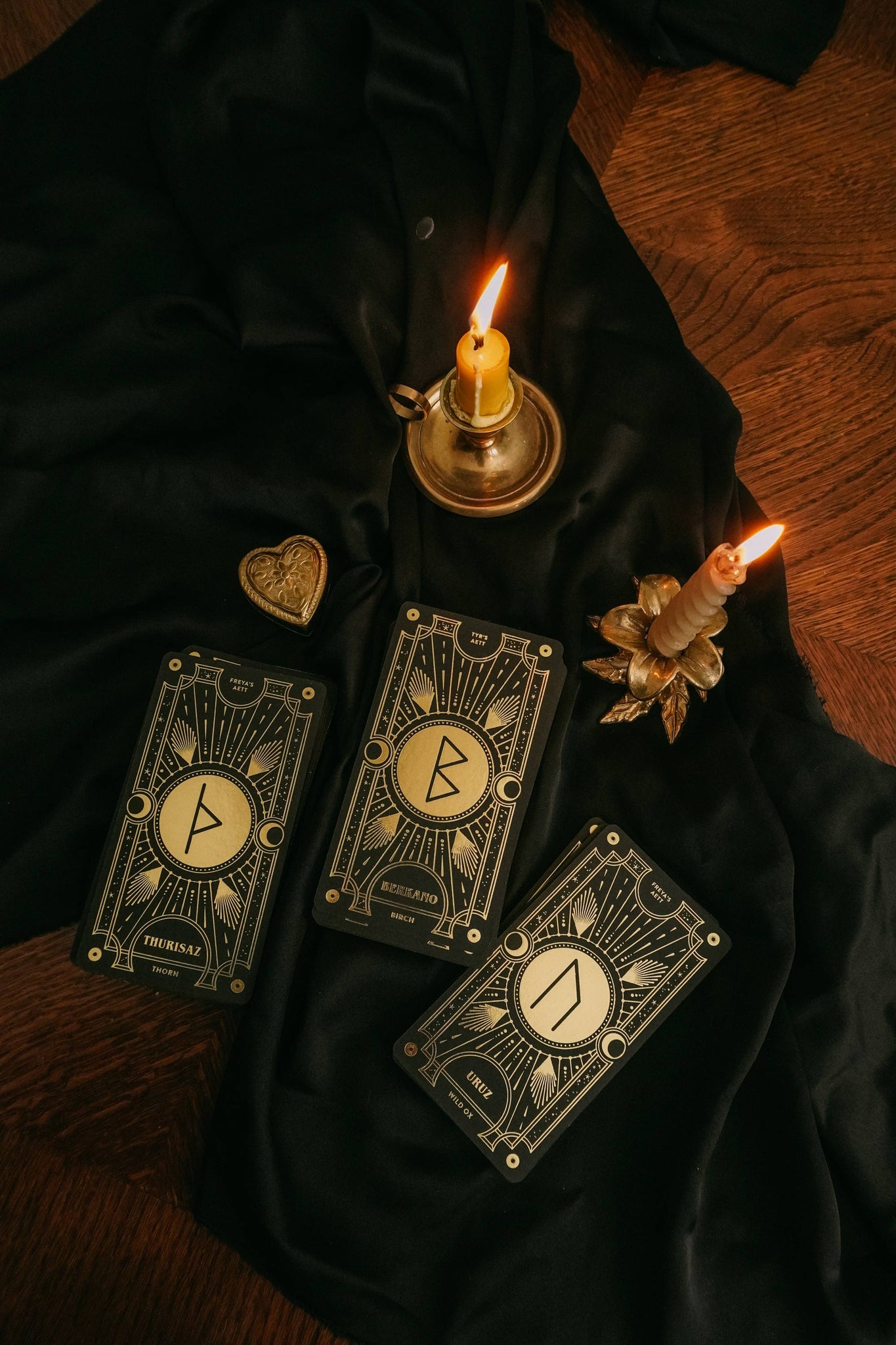 Cosmic Whisper luxury rune deck in black and gold by Cocorrina 