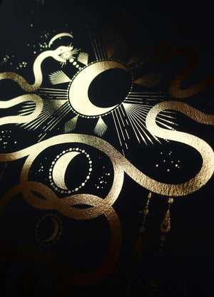 Love by the Moon snakes in gold foil and black paper with stars and moon by Cocorrina