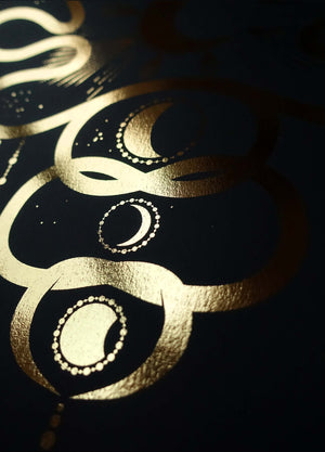 Love by the Moon snakes in gold foil and black paper with stars and moon by Cocorrina