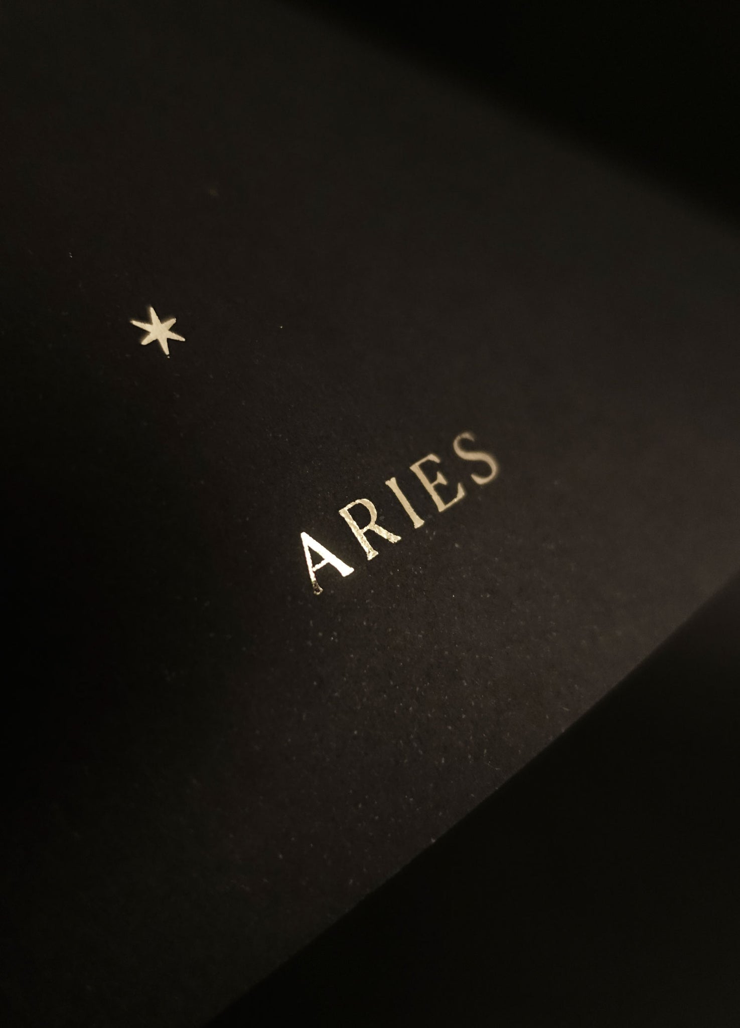 Aries zodiac constellation gold metallic foil print on black paper by Cocorrina