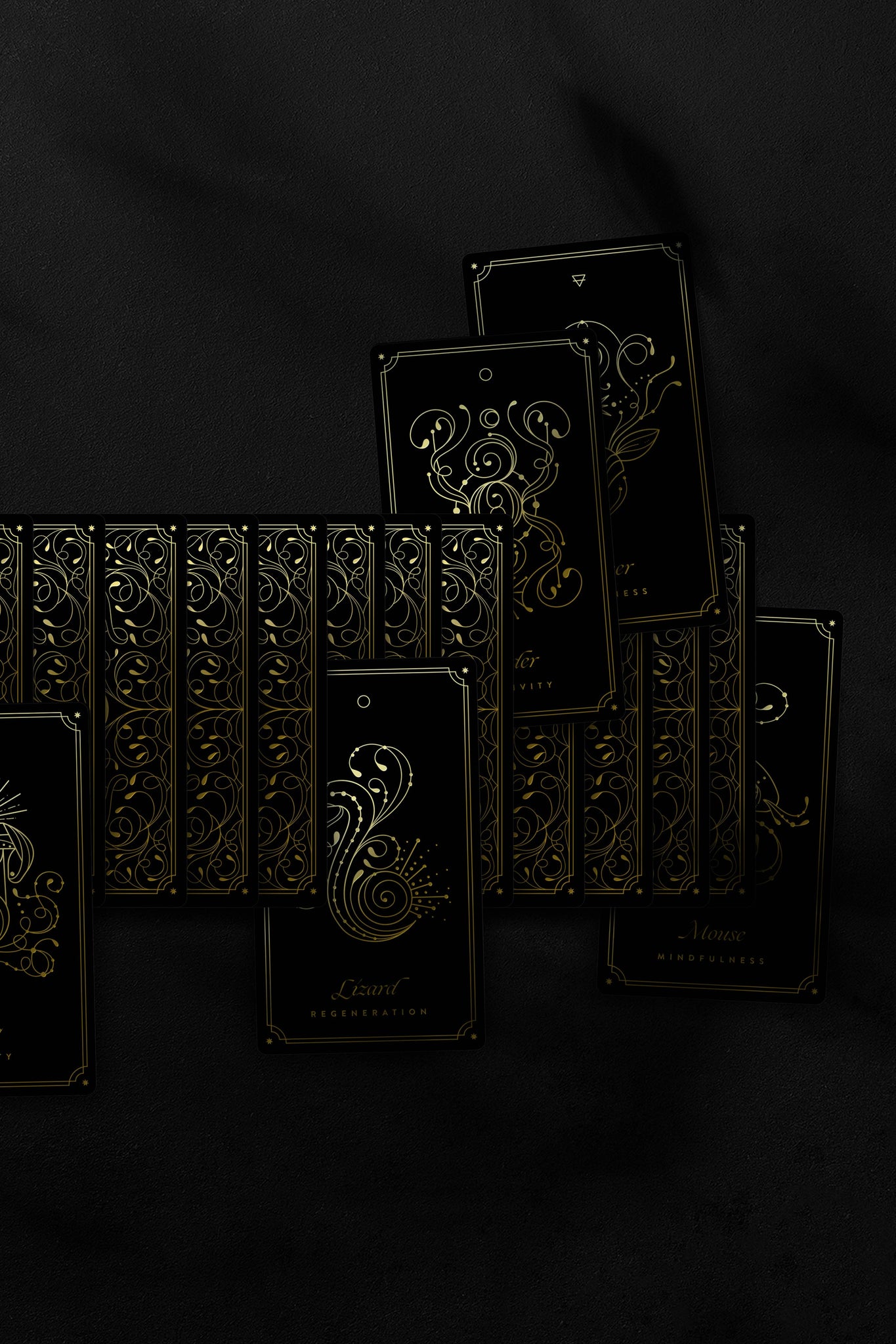 Cosmic Wild Oracle deck with animals by Cocorrina & Co in black and gold