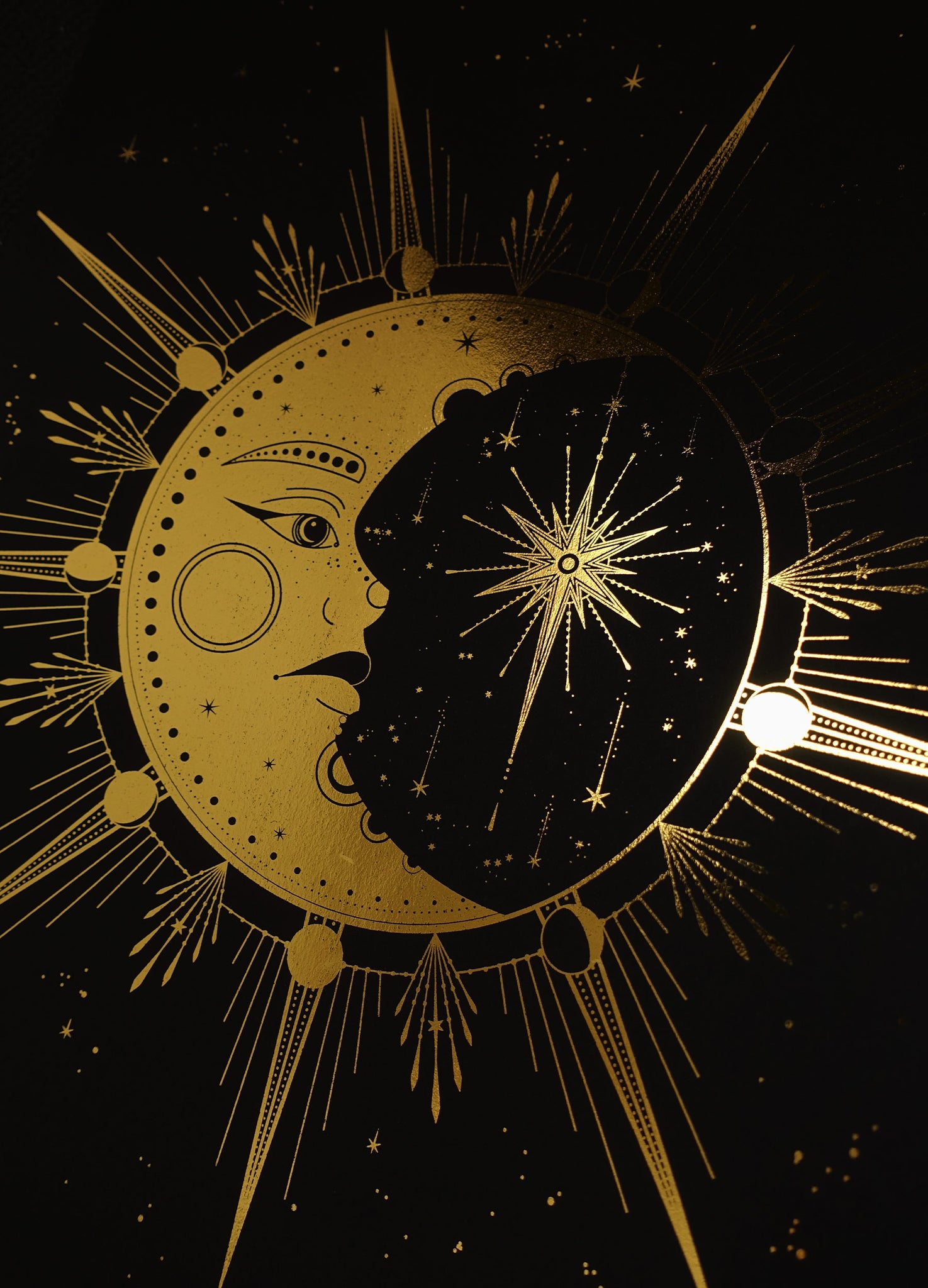 Crescent Moon Face, gold foil and black paper with stars and moon by Cocorrina