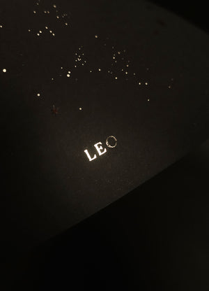 Leo zodiac constellation gold metallic foil print on black paper by Cocorrina