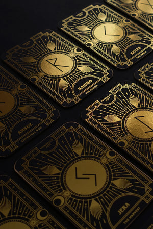 Cosmic Whisper rune deck by Cocorrina & Co in black and gold foil