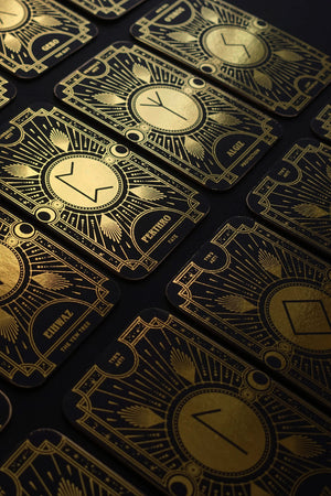 Cosmic Whisper rune deck by Cocorrina & Co in black and gold foil