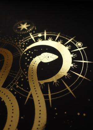 Sacred Snake art print in gold foil and black paper with stars and moon by Cocorrina