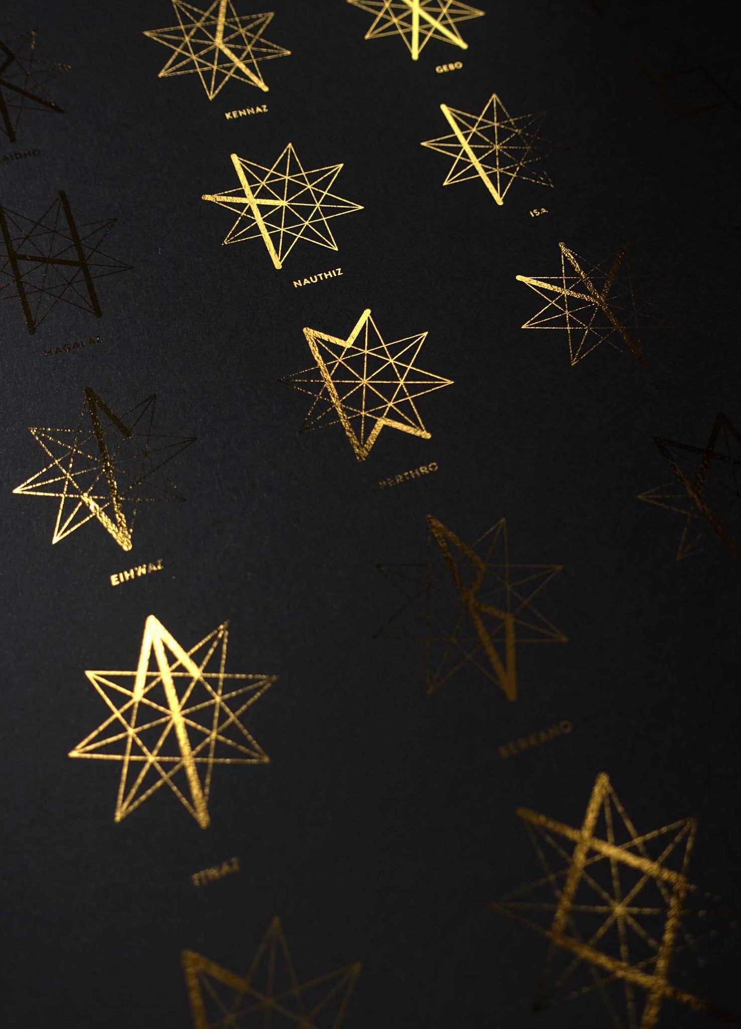 The rune star, set of 24 runes in gold foil black art print by studio Cocorrina design