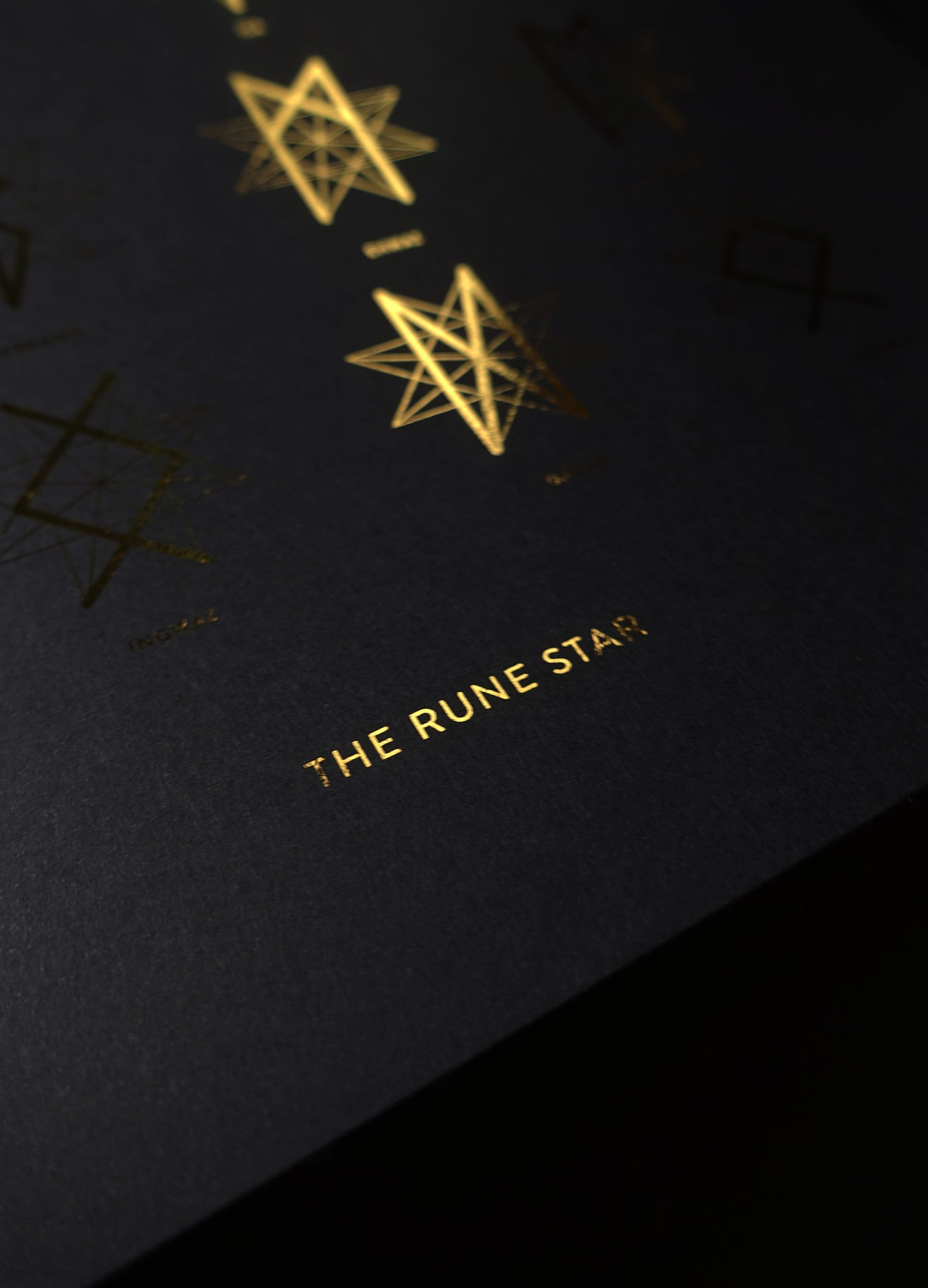 The rune star, set of 24 runes in gold foil black art print by studio Cocorrina design